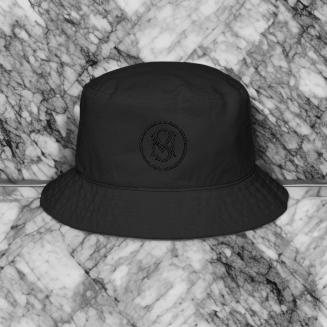 Era Emblem Hat - Selfmade EraHatsSelfmade EraMinimalist black Era Emblem Hat with tonal embroidery, ideal for a bold yet understated style. A must - have bucket hat for summer fashion.
