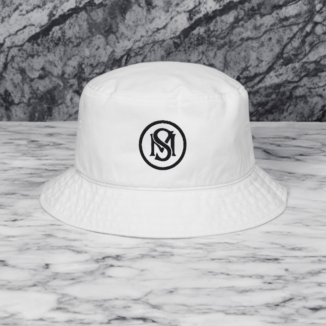Era Emblem Hat - Selfmade EraHatsSelfmade EraWhite cotton twill Era Emblem Hat featuring a centered black embroidered emblem. A trendy bucket hat for outdoor and everyday wear.