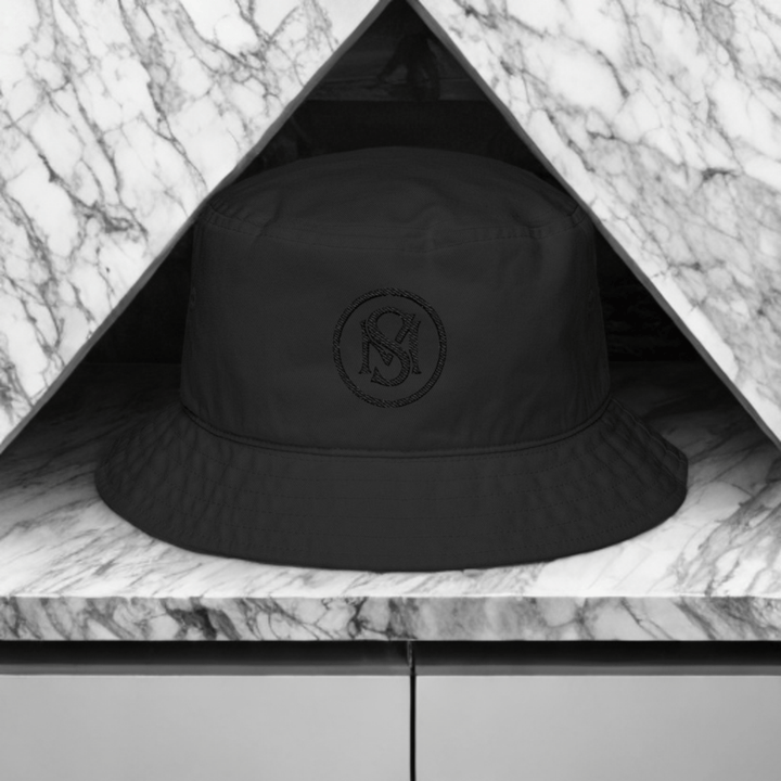 Era Emblem Hat - Selfmade EraHatsSelfmade EraBlack Era Emblem Hat with subtle black embroidery, crafted for a sleek streetwear look. A unique handmade headpiece for modern fashion lovers.
