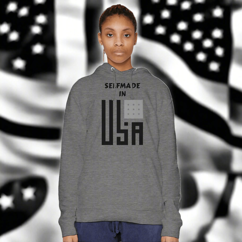 Premium Hoodie - Selfmade EraHoodieSelfmade EraFemale model in gray Premium Hoodie with bold 'Selfmade in USA' graphic, offering a unisex fit and cozy style for modern casual fashion.